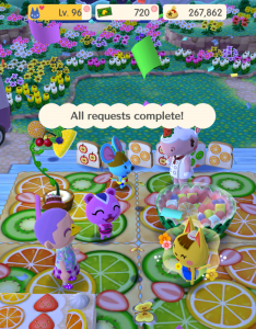 A screenshot from Animal Crossing Pocket Camp, where there is a celebration for completing an event.
